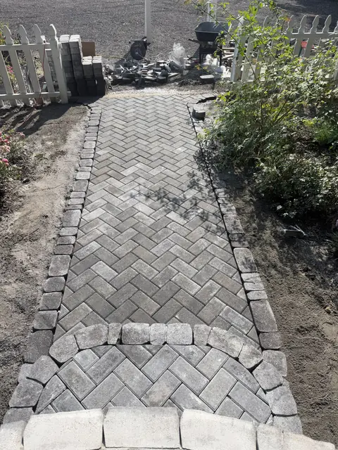 Herringbone paver garden path